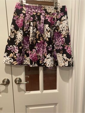 White House Black Market Black Floral Pleated Skirt with Purple and White Blooms